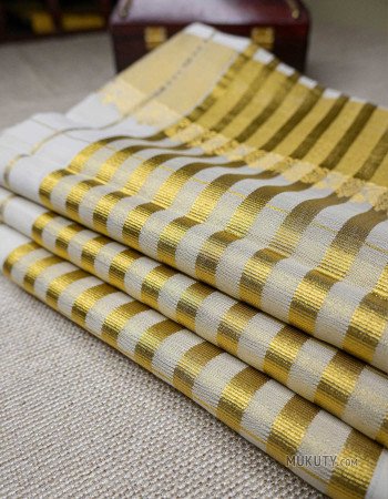 Kerala Traditional Golden Set Saree with dot embroidery